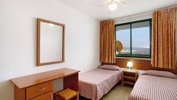 1 dormitorio, tabla de planchar con plancha, wifi gratis y ropa de cama