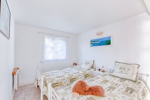 2 slaapkamers, een strijkplank/strijkijzer, gratis wifi, beddengoed