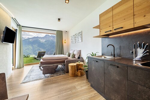 Apartamento vacacional 'Paflur Lodges Lärchenduft' con vistas a la montaña, jardín y Wi-Fi