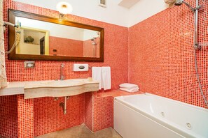 Bathtub, hair dryer, towels
