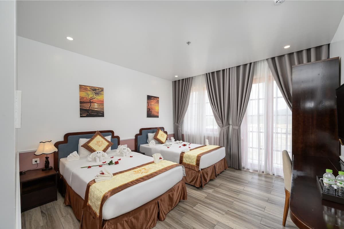 Habitación Deluxe con 2 camas individuales | 1 dormitorio, sistema de insonorización, wifi gratis