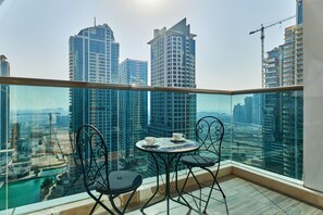 Comfort Apartment | Terrace/patio - 1BR view in a luxurious home (Dubai)