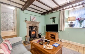 TV, fireplace - The Cottage on the square - a Derbyshire country cottage (Wensley)