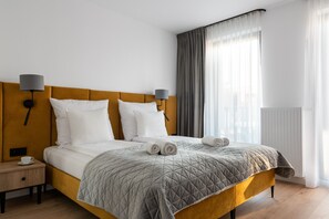 2 habitaciones, tabla de planchar con plancha y cuna de viaje