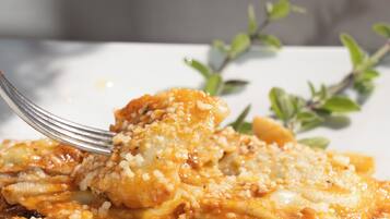 A plate of food with a fork.