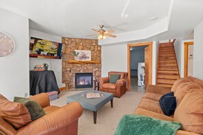 Smart TV, fireplace, foosball, books