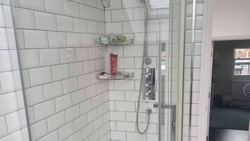 Shower, hair dryer, towels, soap