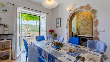 Villa | Private kitchen | Fridge, microwave, oven, stovetop