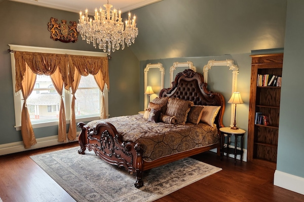 Master Suite Bedroom, King Bed with tufted leather headboard, lots of light