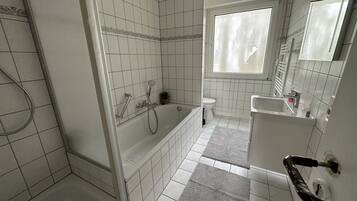 Hair dryer, towels, soap, shampoo