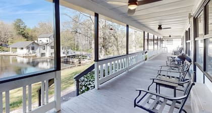 Dog-friendly lakefront condo with pool, canoes, & WiFi - in a perfect location