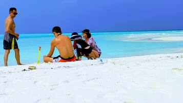 Beach nearby, white sand, free beach shuttle, beach umbrellas
