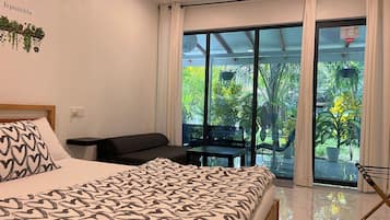 Deluxe Room, Multiple Beds, Garden View, Garden Area | 4 bedrooms, free WiFi, bed sheets