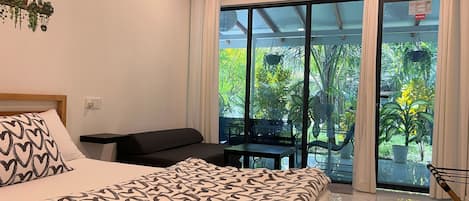 Deluxe Room, Multiple Beds, Garden View, Garden Area