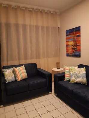 Apartamento básico | Sala de estar