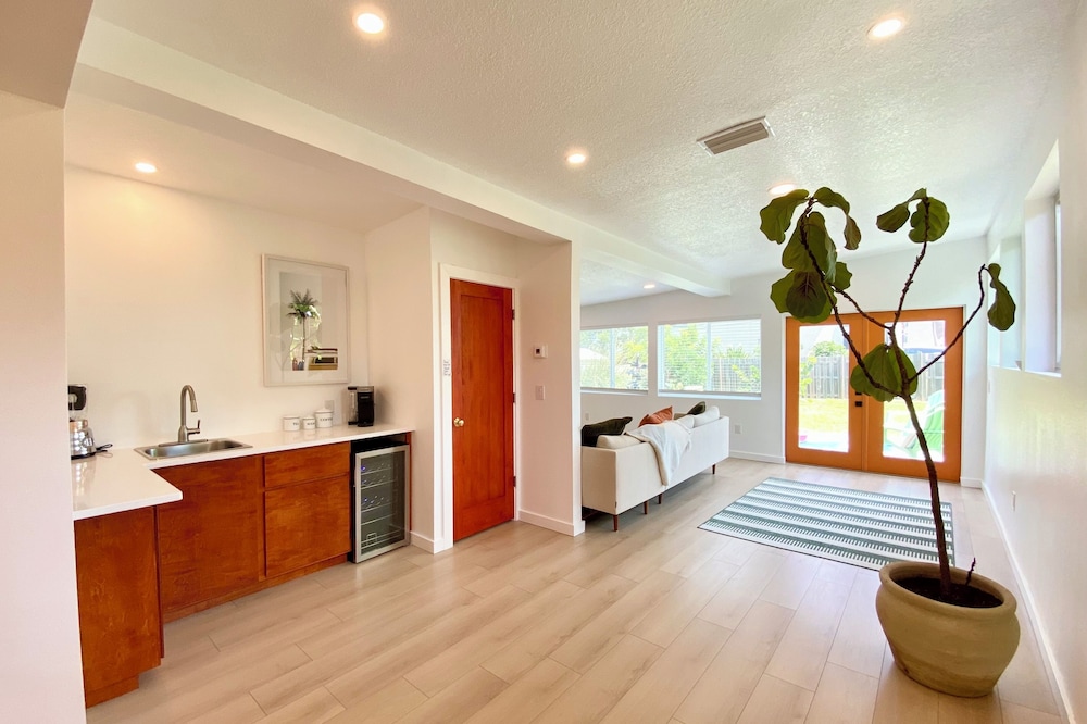 Split floor plan 4 bed 3 bath home! Steps to the sand!