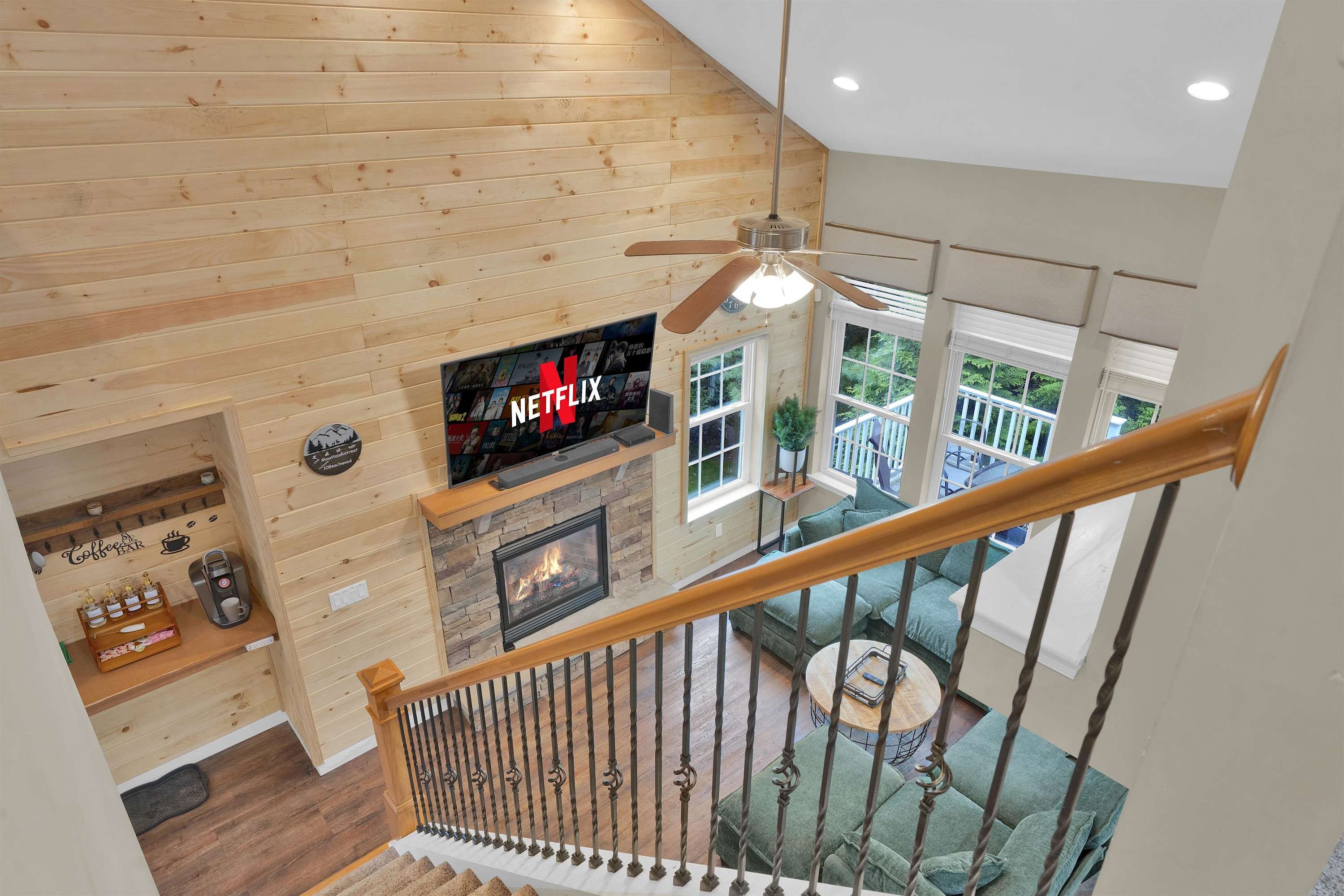 Vaulted Living Room with Fireplace & Large Windows