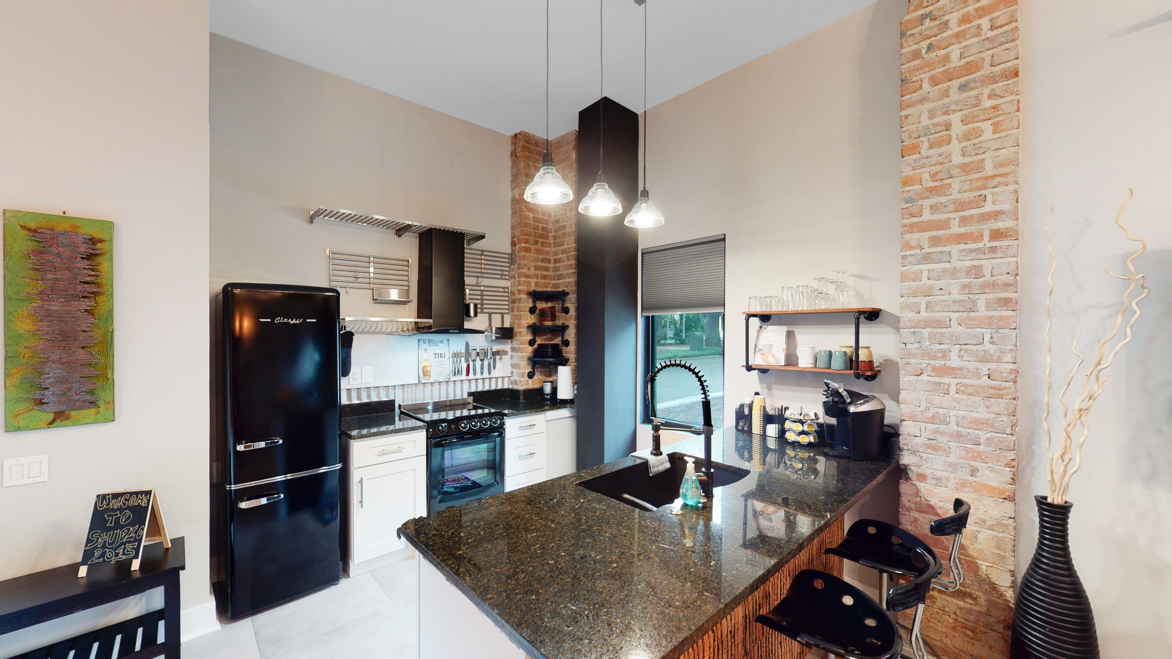 NEW industrial style micro-loft in a quiet neighborhood and walkable to FUN!