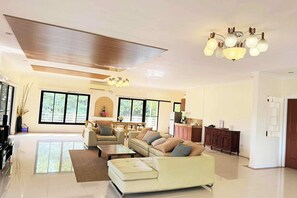 Family Room | Living area | 32-inch TV with cable channels - Torres Farm Resort powered by Cocotel (Naic)