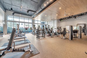 Fitness facility - Luxury 1 BR with Den Downtown Tampa Apt: City Views, Rooftop Pool, Workspace (Tampa)