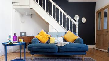 Smart TV, fireplace, books