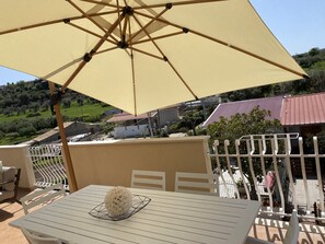 Outdoor dining - Penthouse Appartment with private solarium on roof (Calabria)