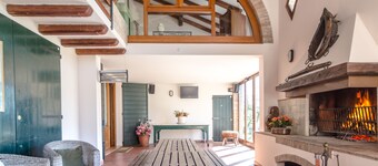 Villa with swimming pool surrounded by greenery