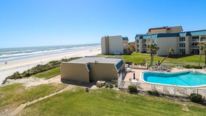 A resort with a pool, beach view, and multiple buildings. - Tradewinds 63 - 3rd Floor Ocean View Unit with Stunning View (St. Augustine)