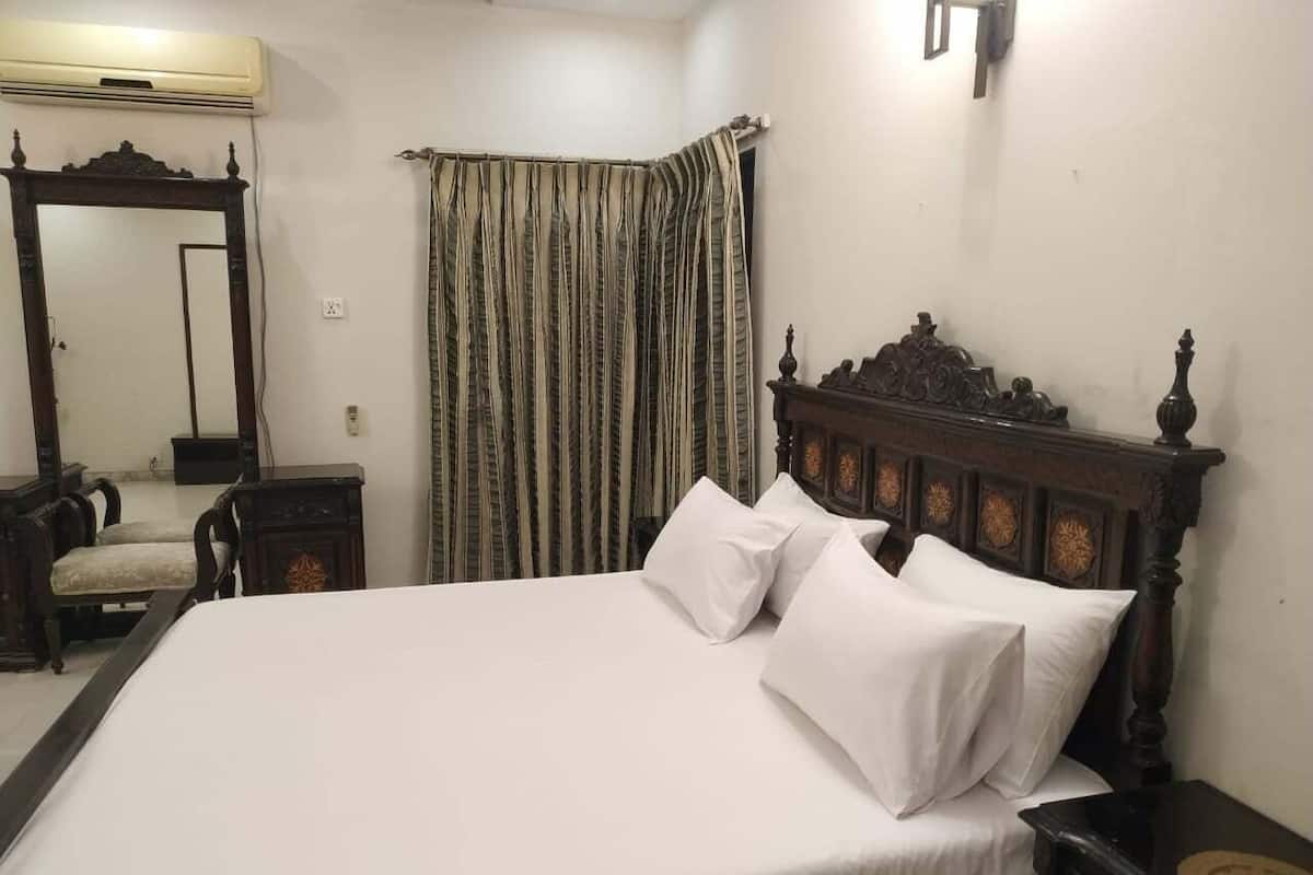 Chambre Double Deluxe | Fer et planche Ă repasser, Wi-Fi gratuit, draps fournis
