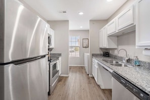 Condo, Multiple Beds, Patio, Garden View (The Spoke) | Private kitchen | Coffee/tea maker