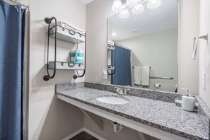 Condo, Multiple Beds, Patio, Garden View (The Spoke) | Bathroom | Combined shower/tub, hair dryer, towels - The Spoke - Experience Branson! (Branson)