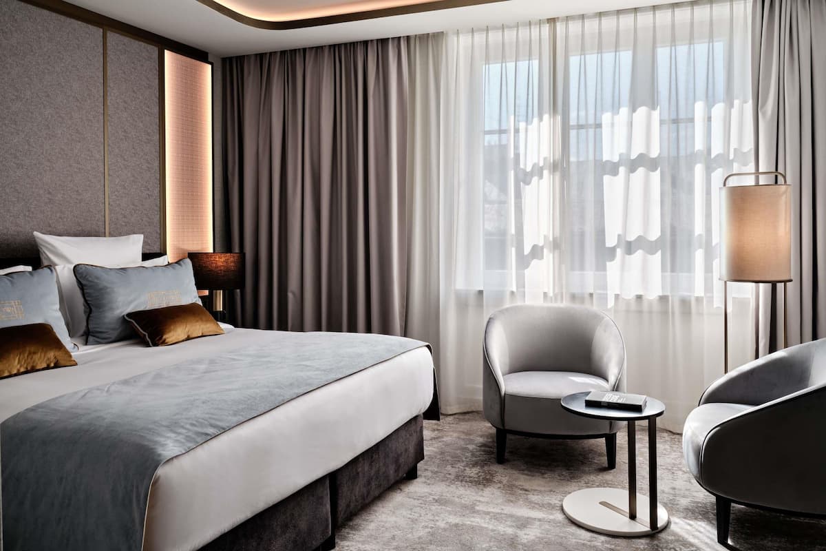Chambre Classique, 1 trĂšs grand lit