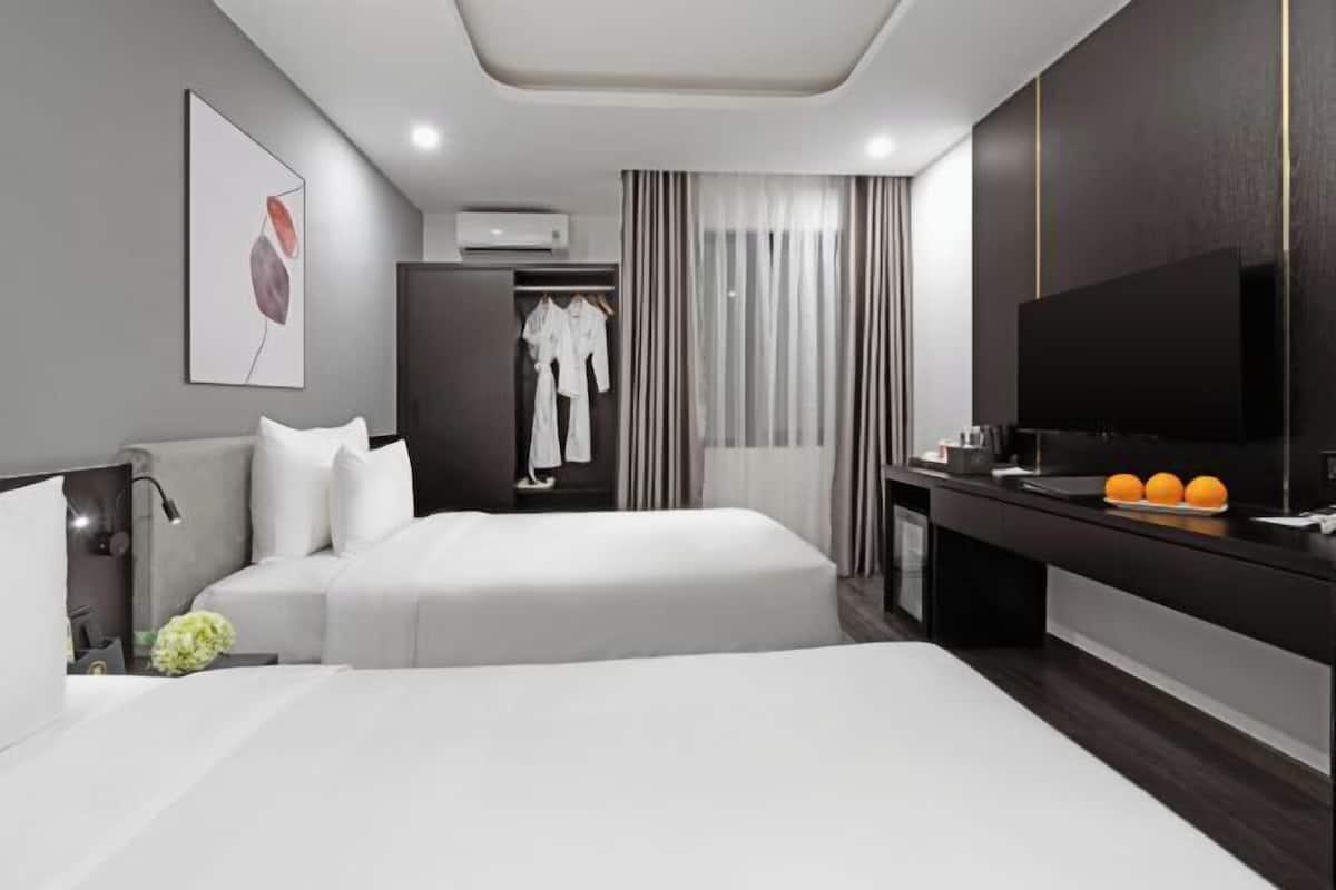 1 Schlafzimmer, hochwertige Bettwaren, Daunenbettdecken, Minibar
