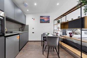 Apartamento superior, banheiro privativo (B1  - Woodstock) | Restaurante