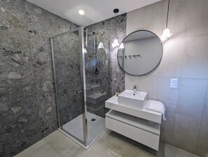 Eco-friendly toiletries, hair dryer, towels, soap