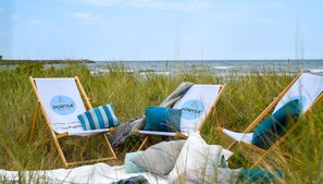 Property grounds - Strandkrabbe - 1st row on the water & beach, ground floor, shower room, terrace (Olpenitz)