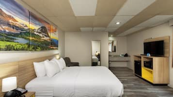 Desk, laptop workspace, iron/ironing board, free cots/infant beds