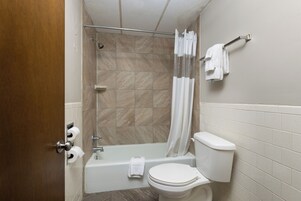 Combined shower/tub, towels, soap, shampoo