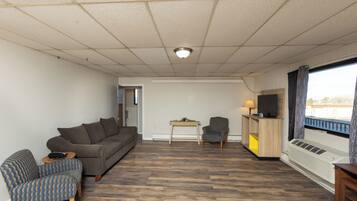 Suite, 2 Queen Beds, Non Smoking | Desk, laptop workspace, iron/ironing board, free cribs/infant beds