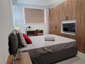2 slaapkamers, een strijkplank/strijkijzer, wifi, beddengoed