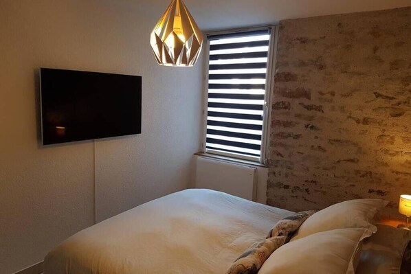 2 habitaciones, tabla de planchar con plancha y wifi gratis 
