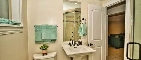 Shower, hair dryer, towels, soap