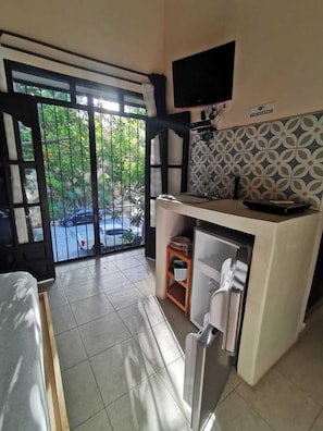 Estudio cama elevada / Vista Remate de montejo | Cortinas opacas, tabla de planchar con plancha, wifi gratis