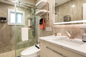 Shower, eco-friendly toiletries, hair dryer, bidet