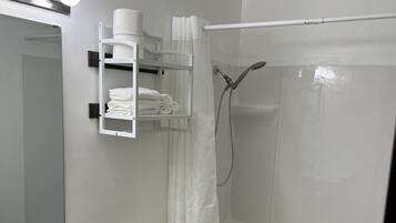 Hair dryer, towels, soap, toilet paper