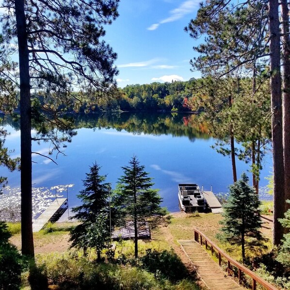 Property grounds - Spacious lakefront cabin on beautiful sand bottom Leader Lake. (Minong)