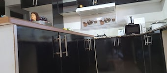 Master Bedroom with Shared Kitchen