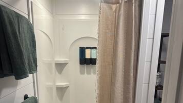 Hair dryer, towels, soap, shampoo
