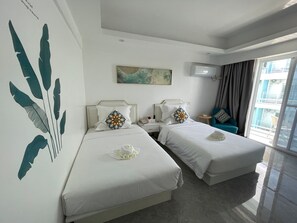 Deluxe Room, 2 Single Beds, Pool View | Hypo-allergenic bedding, down duvets, in-room safe, desk