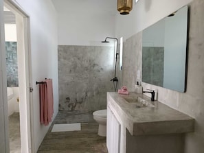 Shower, towels, soap, toilet paper